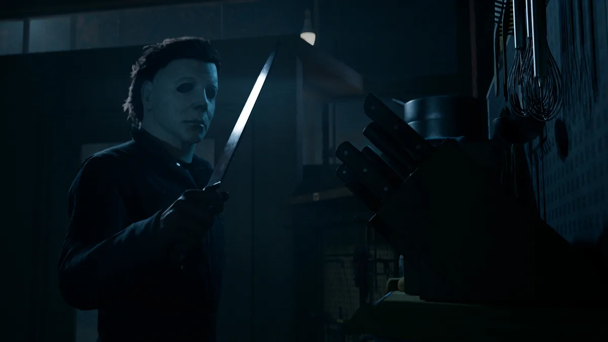 Michael Myers holding a knife in a dark scene from Halloween The Game